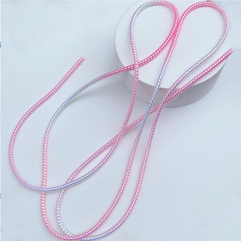 Penggulung Kabel Data iPhone/S - Spring Roll Wrapper ulasan dan harga